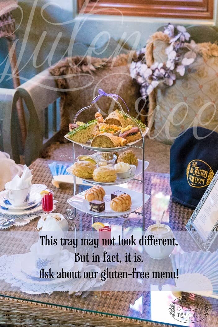 A tiered tray with assorted gluten-free pastries and scones sits on a table set for tea. The background is a cozy, vintage-style room. Text on the image invites guests to ask about the gluten-free menu.